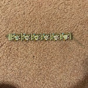 Gold bracelet with flowers